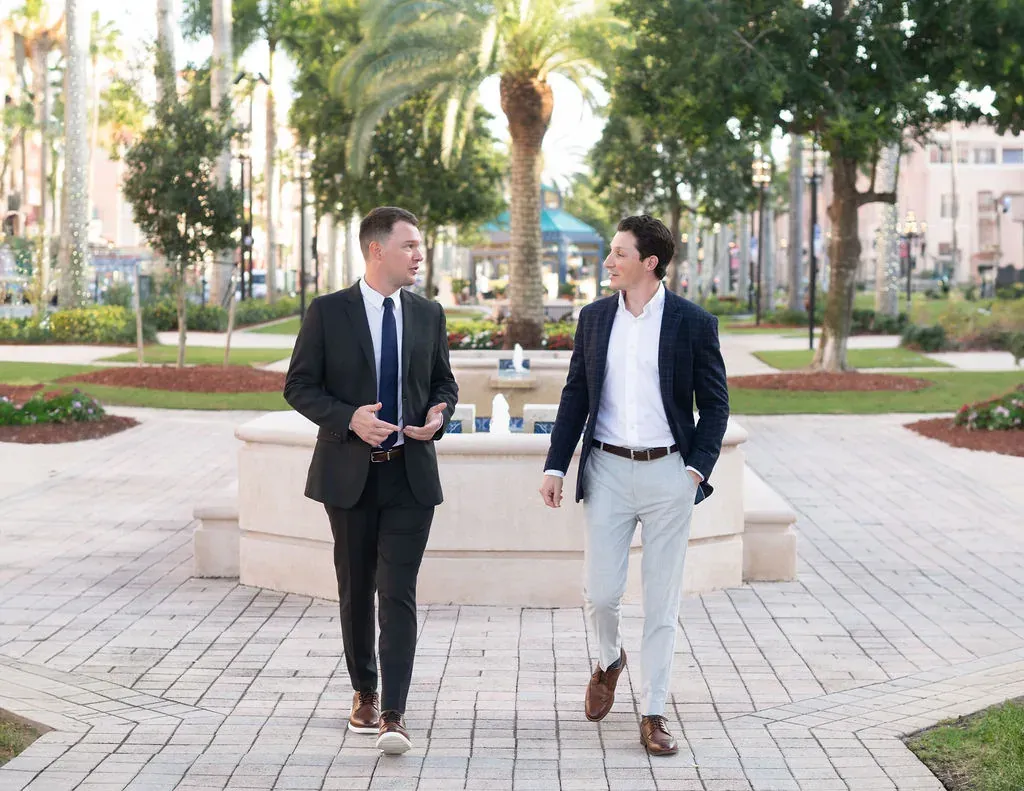 Sanabria Law attorneys walking through Buckhead in Atlanta