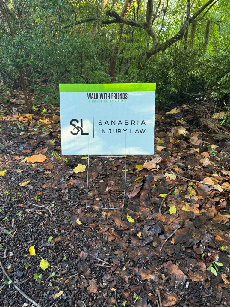 Sanabria Injury Law sponsor sign at the Walk with Friends fundraiser walk