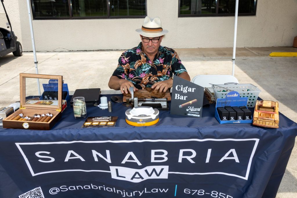 Sanabria Injury Law sponsored cigar bar at a South Florida charity golf event
